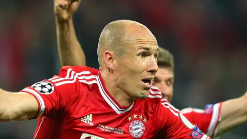 Arjen Robben of FC Bayern Muenchen celebrates after scoring the winning goal during the UEFA Champions League final
