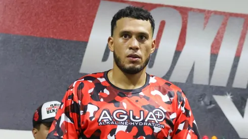 Boxer David Benavidez stands in the ring during a workout as his wife Karina Silva (R) looks on at Pound 4 Pound Gym on January 09, 2025 in Las Vegas, Nevada. Benavidez is scheduled to meet WBA light heavyweight champion David Morrell Jr. in a bout at T-Mobile Arena in Las Vegas on February 01.