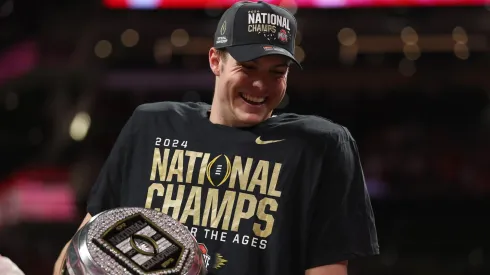 Will Howard #18 of the Ohio State Buckeyes celebrates after beating the Notre Dame Fighting Irish 34-23 in the 2025 CFP National Championship at the Mercedes-Benz Stadium on January 20, 2025 in Atlanta, Georgia.