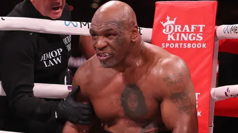 Mike Tyson sits in his corner between rounds against Jake Paul during LIVE On Netflix: Jake Paul vs. Mike Tyson at AT&T Stadium on November 15, 2024 in Arlington, Texas.