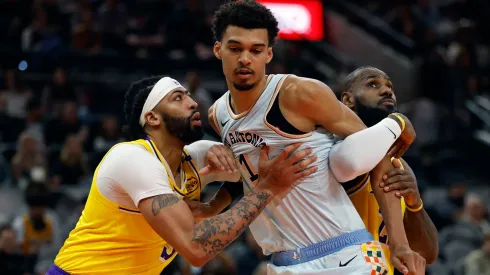 Victor Wembanyama blocks out Anthony Davis during a game between the San Antonio Spurs and the Los Angeles Lakers at Frost Bank Center on November 27, 2024.