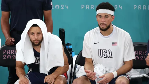 Players from Team United States watch from the bench during the Men's Gold Medal game between Team France and Team United States