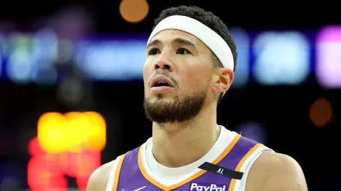 Devin Booker #1 of the Phoenix Suns looks on during a game against the Philadelphia 76ers at the Wells Fargo Center on January 06, 2025 in Philadelphia, Pennsylvania.