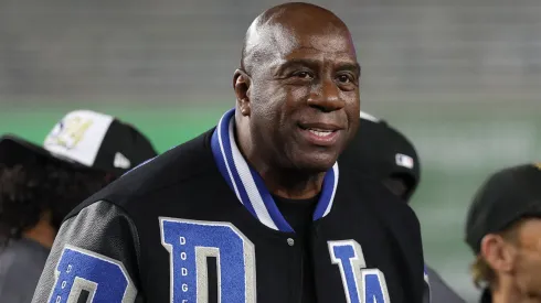 Earvin "Magic" Johnson celebrates with the Los Angeles Dodgers after defeating the New York Yankees during Game Five of the 2024 World Series.