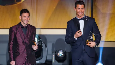 FIFA Ballon d'Or nominees Lionel Messi of Argentina and FC Barcelona (L) and Cristiano Ronaldo of Portugal and Real Madrid smile during the FIFA Ballon d'Or Gala 2014 at the Kongresshaus on January 12, 2015 in Zurich, Switzerland.