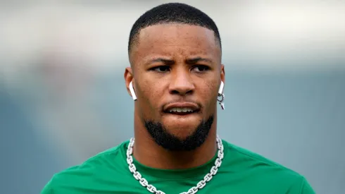 Saquon Barkley #26 of the Philadelphia Eagles looks on before the game against the Dallas Cowboys at Lincoln Financial Field on December 29, 2024 in Philadelphia, Pennsylvania.