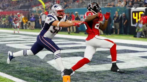 Tevin Coleman #26 of the Atlanta Falcons carries the ball past Rob Ninkovich #50 of the New England Patriots for a six yard touchdown during Super Bowl 51 in 2017.