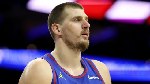 Nikola Jokic #15 of the Denver Nuggets looks on during the first half against the Philadelphia 76ers at the Wells Fargo Center.