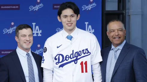 President Baseball Operations Andrew Friedman, Pitcher Roki Sasaki and Manager Dave Roberts speaks pose during a Los Angeles Dodgers press conference at Dodger Stadium on January 22, 2025 in Los Angeles, California.