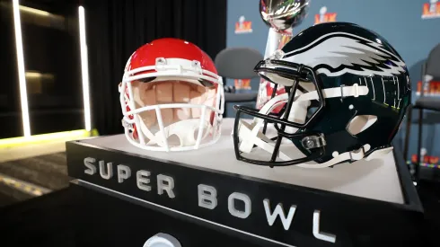 A Kansas City Chiefs helmet, the Vince Lombardi Trophy and a Philadelphia Eagles helmet are seen before the NFL Commissioner Roger Goodell's Super Bowl Press Conference ahead of Super Bowl LIX.