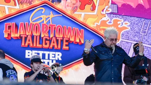 Guy Fieri onstage at Guy Fieri's Flavortown Tailgate on February 11, 2024.