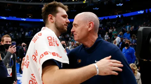 Luka Doncic #77 of the Dallas Mavericks hugs Rick Carlisle head coach of the Indiana Pacers after the game at American Airlines Center on January 29, 2022 in Dallas, Texas.