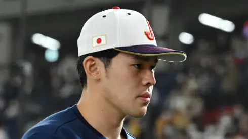 Roki Sasaki #14 of Japan is seen after observing a minute of silence for the victims of the Great East Japan Earthquake on the 12th anniversary prior to the World Baseball Classic Pool B game between Czech Republic and Japan at Tokyo Dome on March 11, 2023 in Tokyo, Japan. Sasaki lost his father and grand parents.