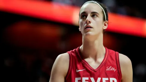 Caitlin Clark #22 of the Indiana Fever looks on as she plays the Connecticut Sun during the first quarter of Game Two of the 2024 WNBA Playoffs first round at Mohegan Sun Arena on September 25, 2024 in Uncasville, Connecticut.