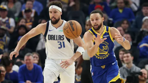 Stephen Curry #30 of the Golden State Warriors is guarded by Klay Thompson #31 of the Dallas Mavericks at Chase Center.