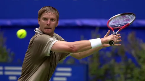 Yevgeny Kafelnikov of Russia looks to the ball during his match against Chris Woodruff of the USA, in the third round of the Australian Open.