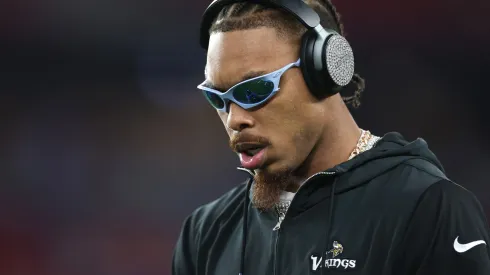Justin Jefferson #18 of the Minnesota Vikings warms up prior to the game against the Los Angeles Rams of the NFC Wild Card Playoff at State Farm Stadium on January 13, 2025 in Glendale, Arizona.