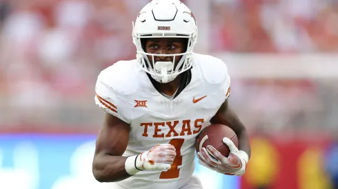 CJ Baxter #4 of the Texas Longhorns runs the ball during the first quarter against the Alabama Crimson Tide at Bryant-Denny Stadium on September 09, 2023 in Tuscaloosa, Alabama.