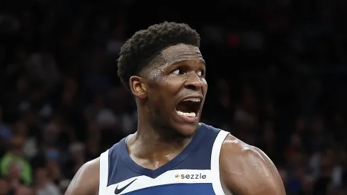 Anthony Edwards #5 of the Minnesota Timberwolves reacts to a slam dunk against Kevin Durant #35 of the Phoenix Suns