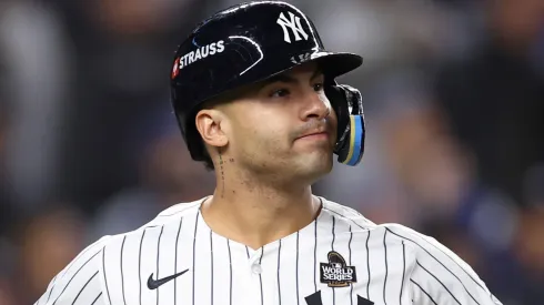 Gleyber Torres #25 of the New York Yankees reacts after hitting a three-run home run during the eighth inning of Game Four of the 2024 World Series against the Los Angeles Dodgers.