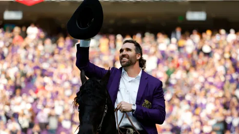 Jared Allen, former defensive end of the Minnesota Vikings, celebrates as he is inducted into the Vikings' Ring of Honor during halftime at U.S. Bank Stadium on October 30, 2022 in Minneapolis, Minnesota.