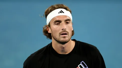 Stefanos Tsitsipas of Greece looks on during a practice session ahead of the 2025 Australian Open