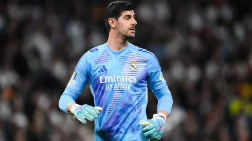 Thibaut Courtois looks on during the UEFA Champions League 2024/25 match between Real Madrid C.F. and Manchester City.