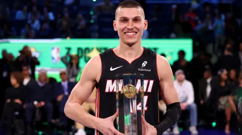 Tyler Herro of the Miami Heat poses with the trophy after winning the 3-Point Contest as part of the 2025 All-Star Weekend.