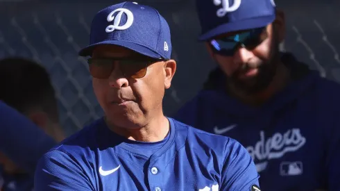  Manager Dave Roberts #50 of the Los Angeles Dodgers looks on during a team workout at Camelback Ranch on February 15, 2025 in Glendale, Arizona. 
