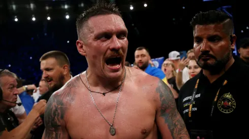 Oleksandr Usyk celebrates victory after defeating Daniel Dubois during the Heavyweight fight between Oleksandr Usyk and Daniel Dubois at Stadion Wroclaw on August 26, 2023 in Wroclaw, Poland.