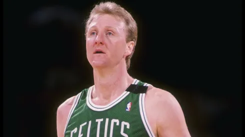Forward Larry Bird of the Boston Celtics stands on the court during an NBA game.