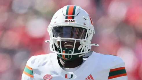 Cam Ward #1 of the Miami Hurricanes runs with the ball against the Louisville Cardinals
