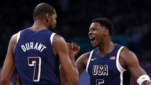 Kevin Durant #7 and Anthony Edwards #5 of Team United States high five during the first half of the Men's Group Phase – Group C game between Serbia and the United States on day two of the Olympic Games Paris 2024 at Stade Pierre Mauroy on July 28, 2024 in Lille, France.