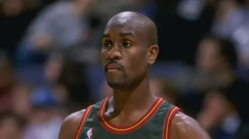 Guard Gary Payton of the Seattle Supersonics stands on the court during a game against the Seattle Supersonics