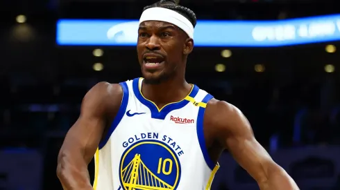 Jimmy Butler III #10 of the Golden State Warriors argues a call during the first half of a basketball game against the Charlotte Hornets at Spectrum Center on March 03, 2025 in Charlotte, North Carolina.