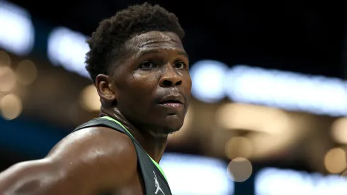 Anthony Edwards #5 of the Minnesota Timberwolves looks on during the first half of the game against the Charlotte Hornets.