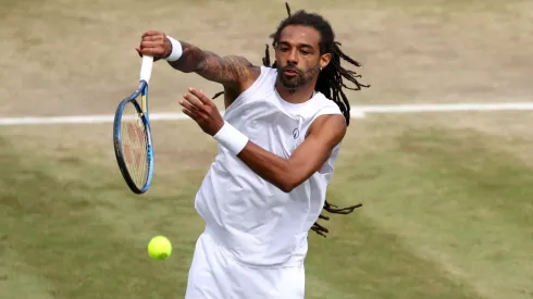 Dustin Brown of Jamaica in the Gentlemen's Doubles third round match during day eight of The Championships Wimbledon 2024.