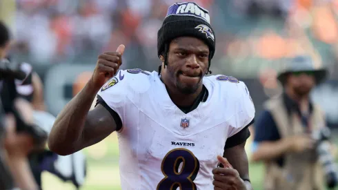 Lamar Jackson #8 of the Baltimore Ravens reacts after defeating the Cincinnati Bengals in overtime at Paycor Stadium on October 06, 2024. (Source: Andy Lyons/Getty Images)