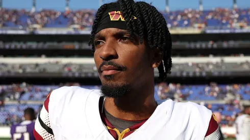 Jayden Daniels #5 of the Washington Commanders walks off the field after their 23-30 loss to the Baltimore Ravens at M&T Bank Stadium on October 13, 2024 in Baltimore, Maryland.