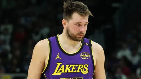 Luka Doncic #77 of the Los Angeles Lakers walks backcourt during the second half of a game against the Milwaukee Bucks at Fiserv Forum on March 13, 2025 in Milwaukee, Wisconsin.