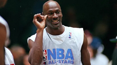 Michael Jordan #23 of the Chicago Bulls smiles on the court during the NBA All-Star Practice.