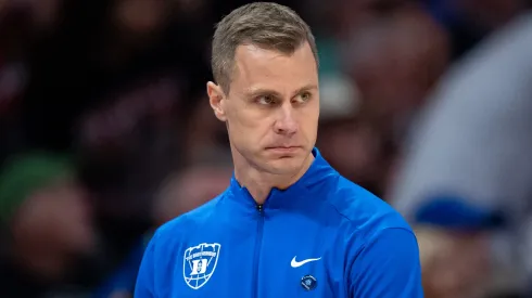 Head coach Jon Scheyer of the Duke Blue Devils looks on in the first half against the Louisville Cardinals during the championship round of the ACC men's basketball tournament at Spectrum Center on March 15, 2025 in Charlotte, North Carolina.