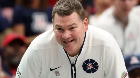 Head coach Tommy Lloyd of the Arizona Wildcats watches from the bench during the semifinal game of the Big 12 men's basketball tournament against the Texas Tech Red Raiders at T-Mobile Center on March 14, 2025 in Kansas City, Missouri.