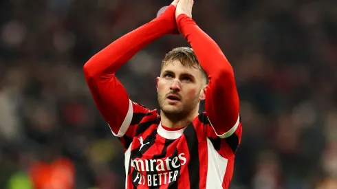 Santiago Gimenez of AC Milan celebrates scoring his team's first goal during the UEFA Champions League 2024/25 League Knockout Play-off second leg match between AC Milan and Feyenoord in 2025.