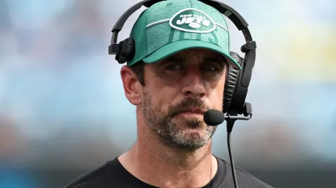 Aaron Rodgers #8 of the New York Jets looks on from the sideline during the second quarter of a preseason game against the Carolina Panthers at Bank of America Stadium on August 12, 2023 in Charlotte, North Carolina.