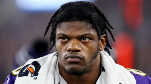 Lamar Jackson #8 of the Baltimore Ravens looks on during the the AFC Divisional Playoff game against the Tennessee Titans on January 11, 2020 in Baltimore, Maryland.