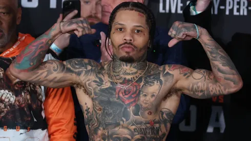 Gervonta Davis steps on the scale and poses at the weigh in defending his WBA lightweight title bout against Lamont Roach Jr.at Barclays Center on February 28, 2025 in New York City.
