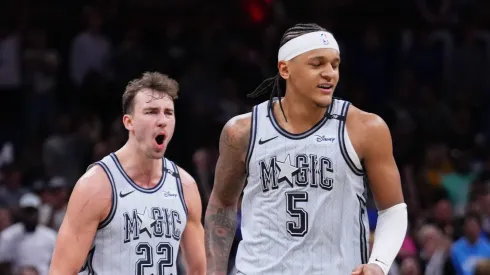 Franz Wagner #22 and Paolo Banchero #5 of the Orlando Magic celebrate after scoring against the San Antonio Spurs