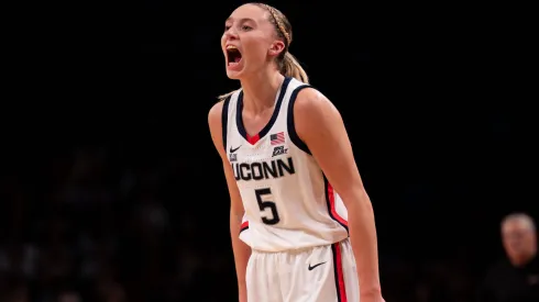 UConn Huskies guard Paige Bueckers reacts to a play during the first half against the Louisville Cardinals.