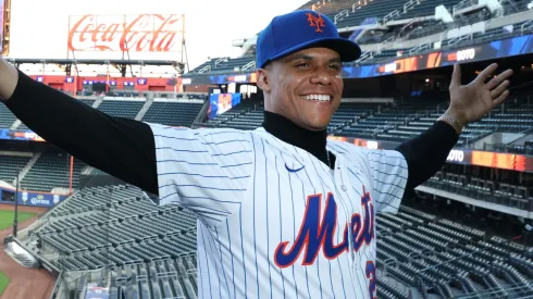 Juan Soto of the New York Mets poses with his new uniform after his introductory press conference at Citi Field on December 12, 2024 in New York City.